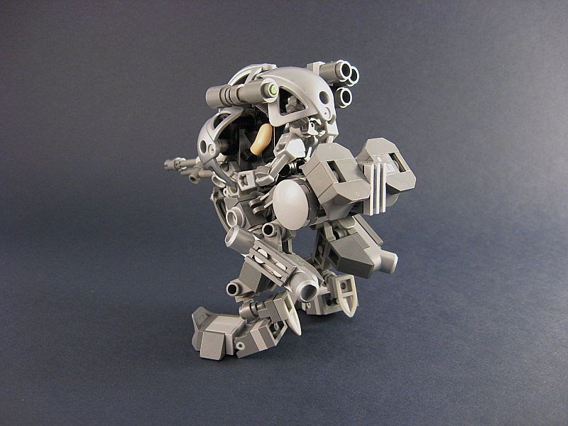 Illustration for article titled UM-5 War Doll Lego Mecha Pops Open To Reveal Pilot Cockpit